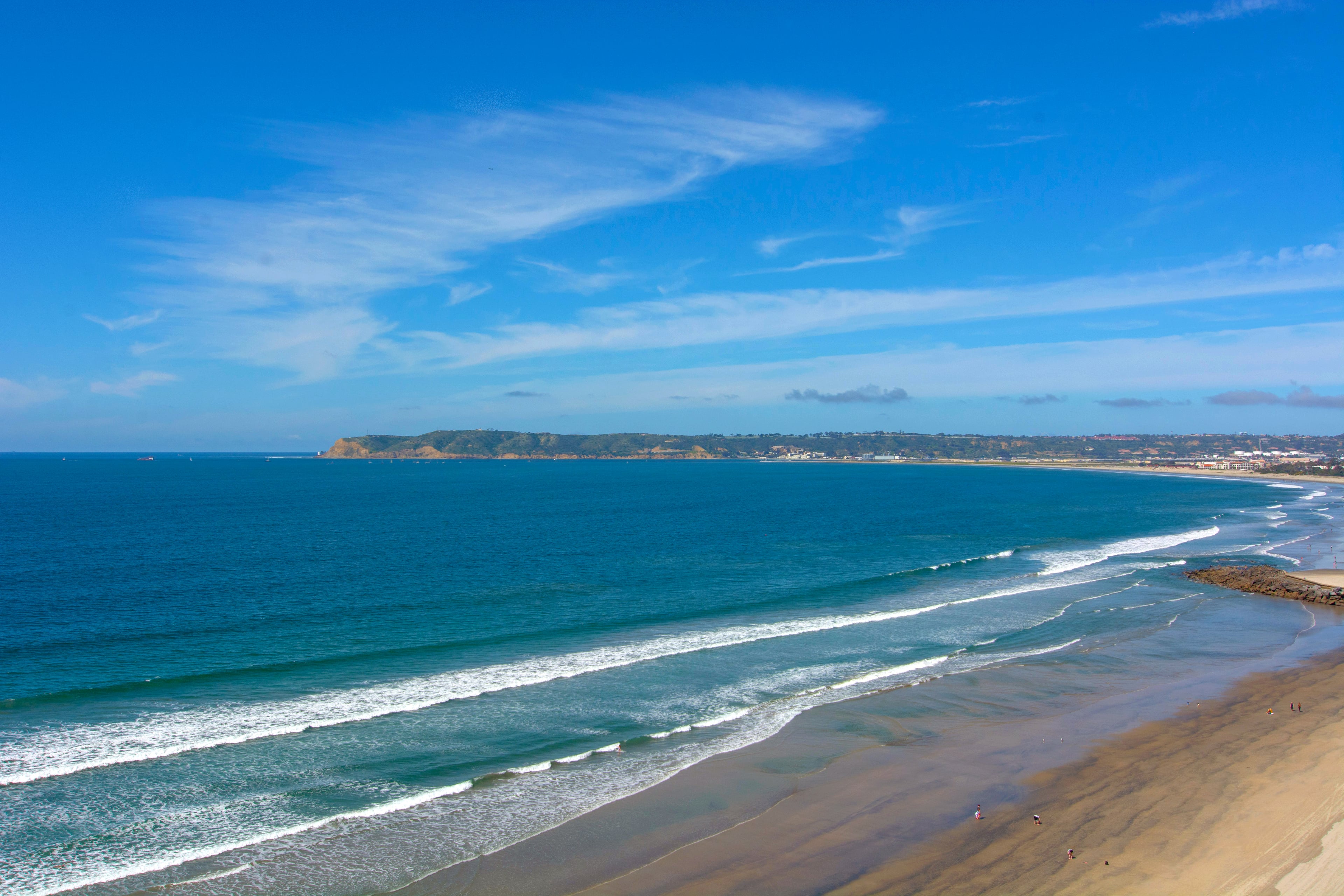 Aerial daytime view of the Coronado coastline toward Point Loma